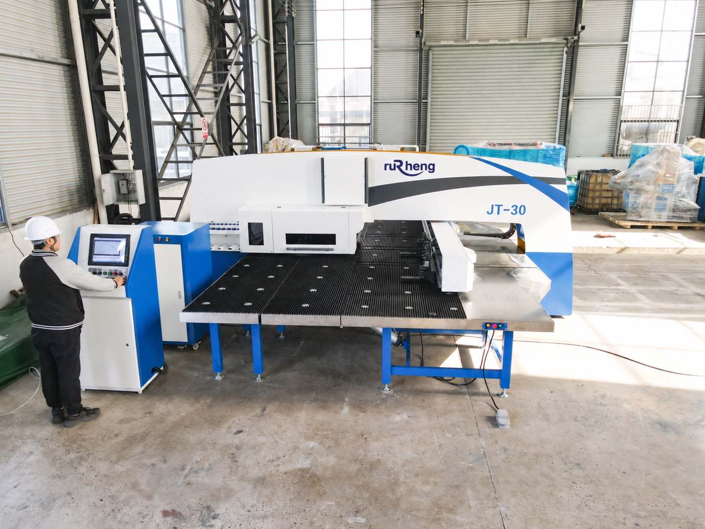 CNC turret punch press with sheet positioning table and operator console