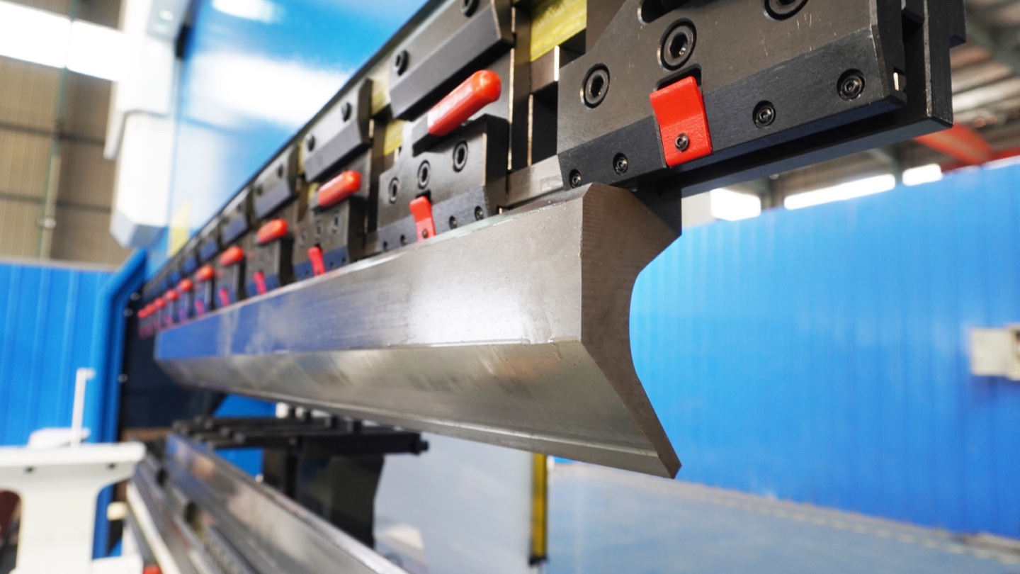 Installed gooseneck punch with recessed profile for flange clearance