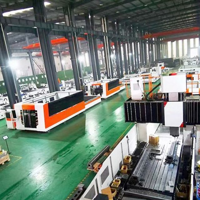 Worker Operating Industrial Machine